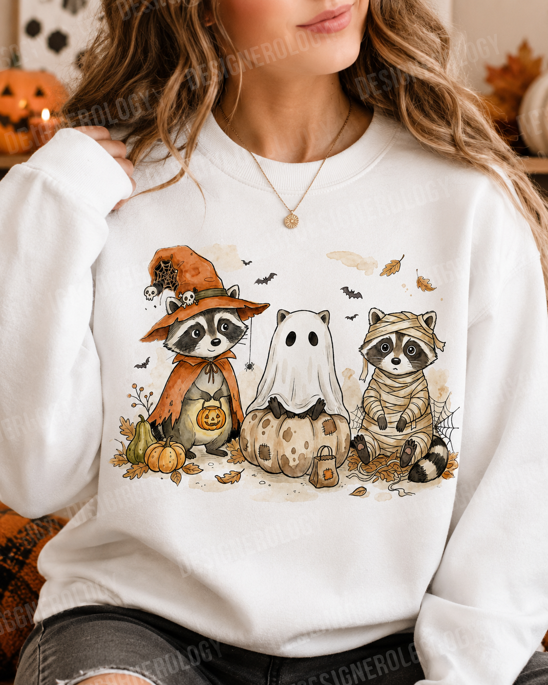 Cute whimsical Halloween raccoon trio PNG featuring a witch raccoon, ghost raccoon, and mummy raccoon with pumpkins, autumn leaves, bats, and cobwebs, perfect for sublimation, t-shirts, tote bags, mugs, and print-on-demand projects.